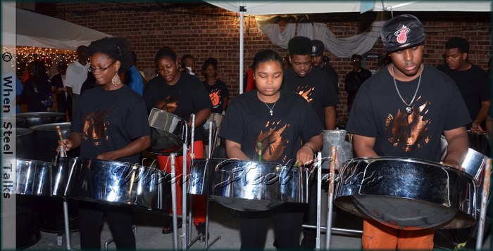 CrossFire Steel Orchestra performs at their 2013 Panyard opening