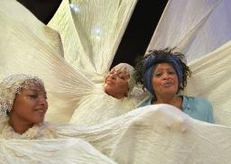 Geraldine Connor (right) with performers from the Carnival Messiah's 2002 revival at West Yorkshire Playhouse