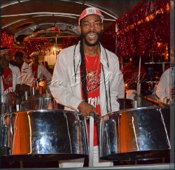 Peter Nelson aka “Bomber” and “Showtime” with D’Radoes Steel Orchestra