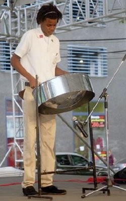 Eighteen-year-old Philip Dupigny of St George's College is the picture of concentration as he demonstrates his skill and technique on the tenor pan at the NGC SanFest Open Air Concert, held on the Brian Lara Promenade, Port-of-Spain last week Friday. 