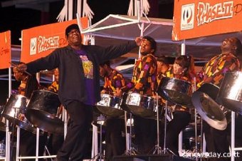 Winning Groove: Len 'Boogise' Sharpe skips along to Phase II Pan Groove's winning performance of 'Jump High' at the Panorama (large band) finals, Queen's Park Savannah, Port-of-Spain on Saturday night.