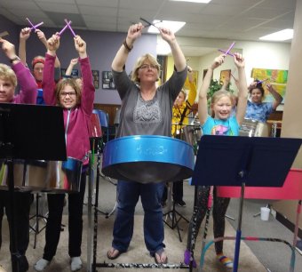 Members of the Steel Doves steel drum band rehearse. The Steel Doves are scheduled to perform at a steel drum concert at 7:30 p.m. Friday at Festival Hall along with Angel Lawrie, John Patti and other special guests.