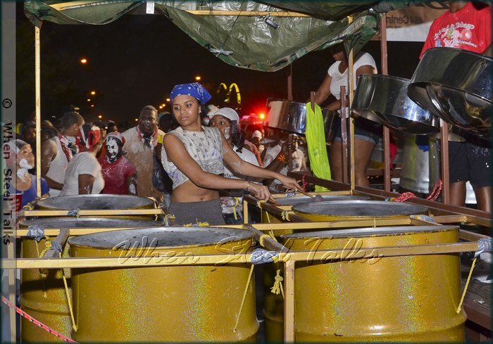 Ashley George on six-bass with Oasis Steel Orchestra during J’Ouvert celebrations in Brooklyn, New York