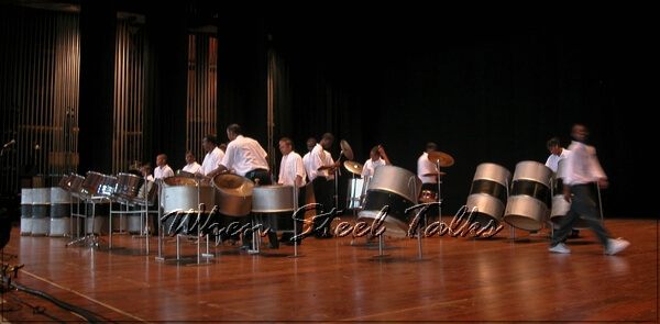 CYP expertly sets up their steelpan instruments