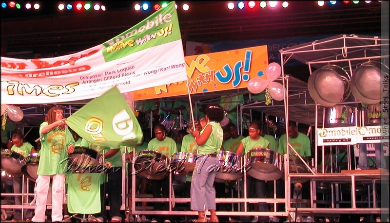 Denyse Plummer as Flag woman at left, for Our Boys Steel Orchestra