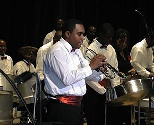 Pan Rebels stage side at a Christmas concert, 2001 - co-founder Gary Rogers is on trumpet