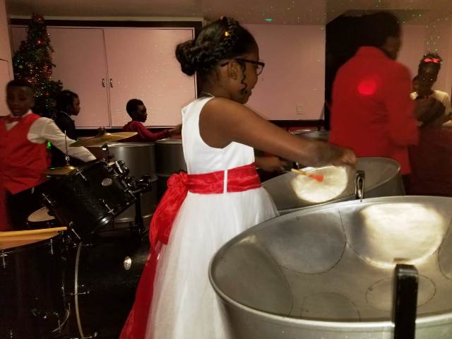 The Denderah School of Music steelband performs at its last recital