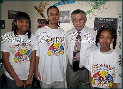 Ellie Mannette & youthful members of Dem Stars Steel Orchestra