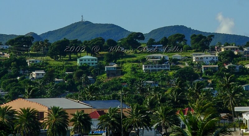 The higher of these two peaks - pictured - is Boggy Peak, Antigua’s highest mountain, as viewed from the Heritage Hotel in St. John’s.  Boggy Peak is on track to be renamed Mount Obama