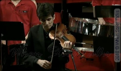 Acclaimed violinist and assistant professor at NIU Blaise Magniere accompanies the NIU Steelband