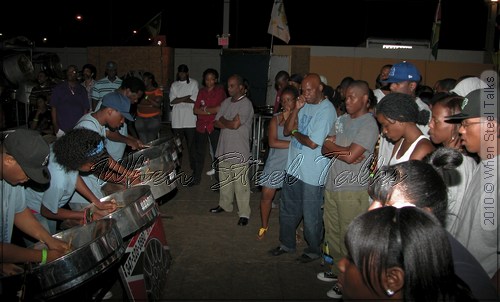 Onlookers take in the performance of Harmony Music Makers at Despers USA band launch