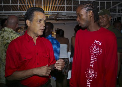 Edwin Pouchet (l),  leader of Silver Stars Steel Orchestra chats with band drillmaster Donell "Bravo" Thomas