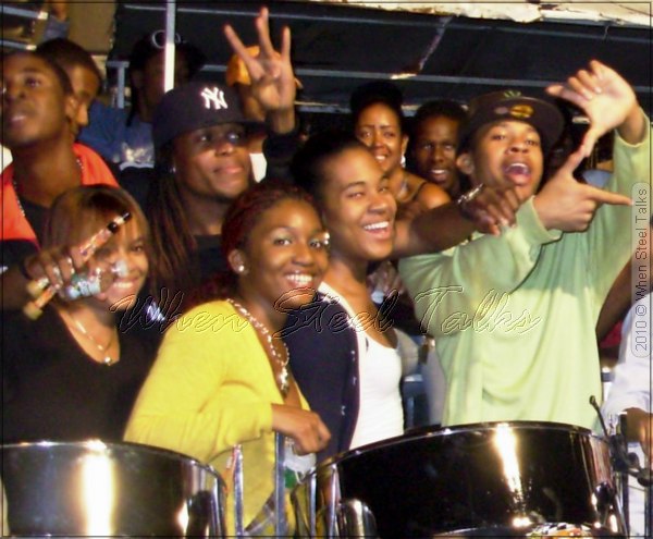 Ryan Joseph with some of the Pan Sonatas crew at their panyard