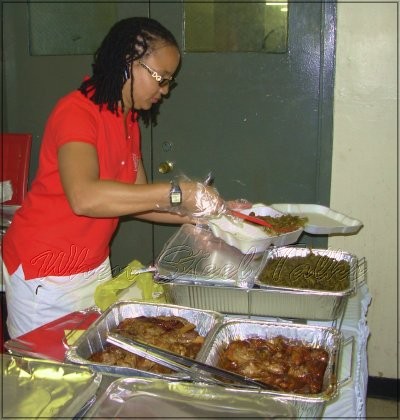 Utopia Pan Soul member serving up the food