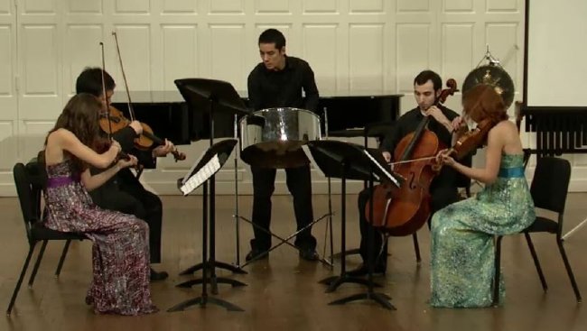 Andy Akiho on steel pan performing with string quartet in Jordan Kuspa's Hit the Spot at the Yale University School of Music