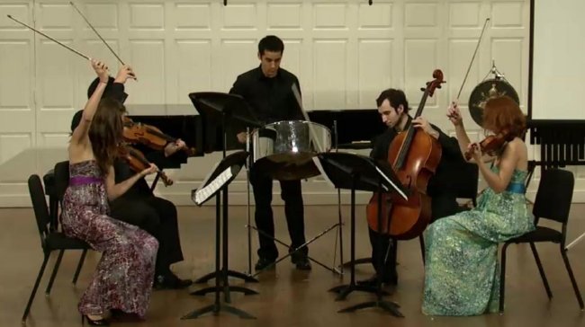 Andy Akiho on steel pan performing with string quartet in Jordan Kuspa's Hit the Spot at the Yale University School of Music