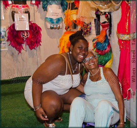 Manty Benjamin (right) with friend - enjoying everything CASYM's launch had to offer