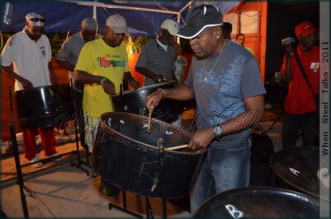 Brian �Bean� Griffith (in black cap) takes the band through their paces