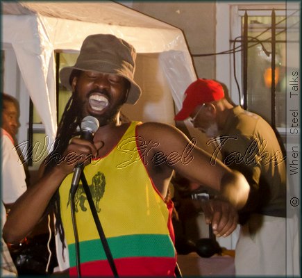 Guest artist Otis Smith delivering his ditty Obama