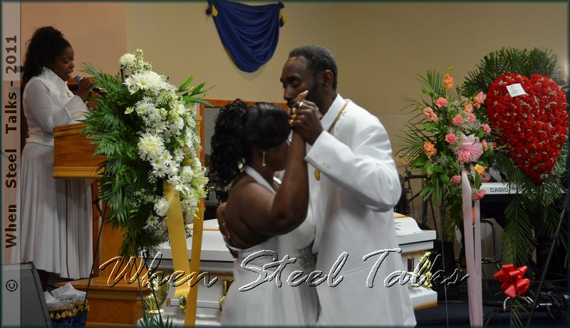 Mr. & Mrs. Victor Deane dance while Africa McGroaber sings Latavia's favorite song