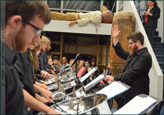 Musical director Josh Quillen conducts NYU Steel