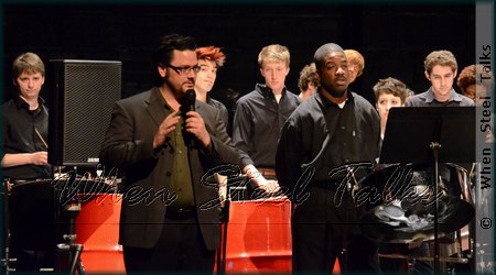 Event co-host Andrew Beall (with microphone) of PAS-NY addresses audience