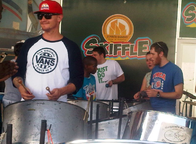 Crew members of the British Royal Navy Ship learn pan