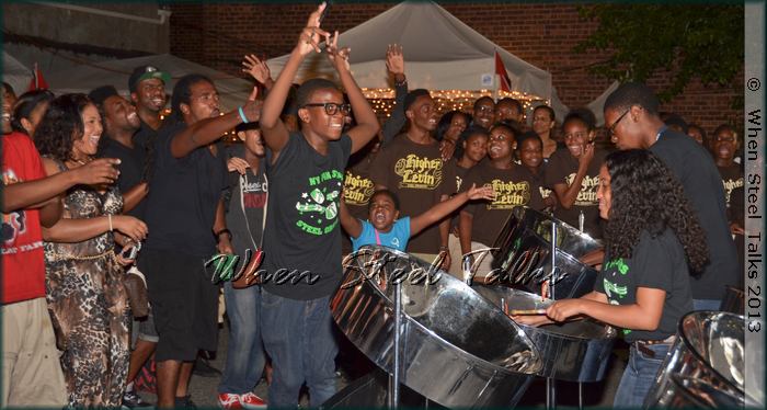 New York Pan Stars member dancing out from behind his tenor