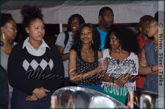Taking in the steelband performance at the Panyard opening