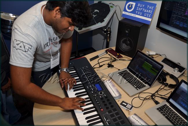 Via keyboards, steelpan musician Johann Chuckaree demonstrates the capabilities of the Indigisounds software