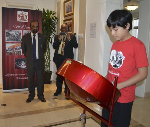 Dylan Yuk Low performs at the Trinidad & Tobago Embassy in China
