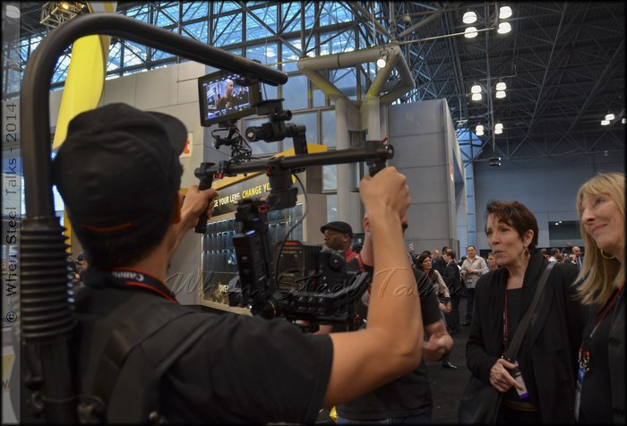 Attendees are captivated with the Ronin Handheld Gimbal, being demonstrated here using a body harness