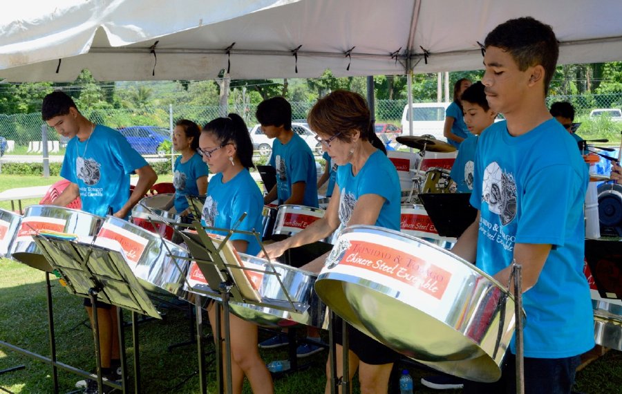Members of the Trinidad & Tobago Chinese Steel Ensemble perform