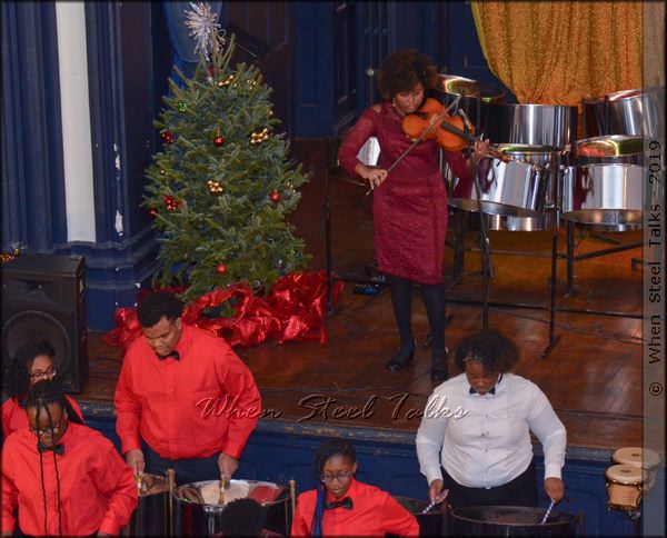 Violist Asiah Wharton performs with CrossFire Steel Orchestra