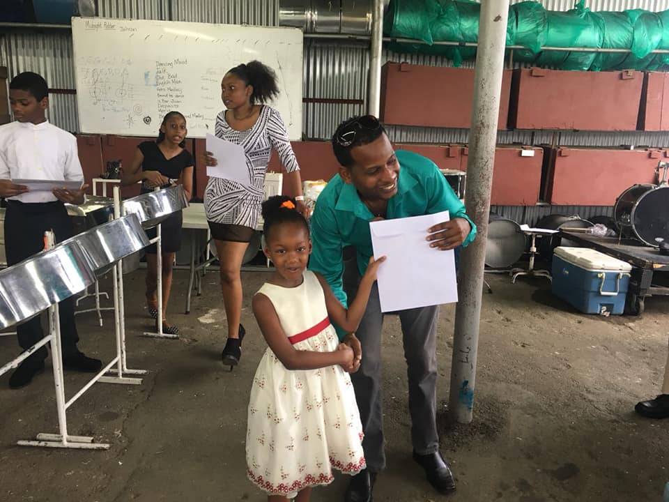 Steelpan Instructor Aquil Arrindell with graduating class