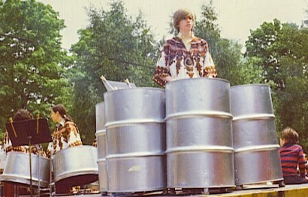 Daniel Harrison:  1975, Memorial Day, Chappaqua New York. Calliope's Children Steel Drum Band on a flatbed truck hauled along the parade route. My six-drum bass rig. In memory of Jimmy Leyden.