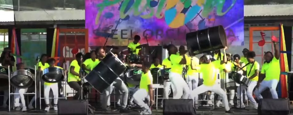 Leon Hess Comprehensive/Fusion Steel Orchestra players keep the music going with bass pans hoisted