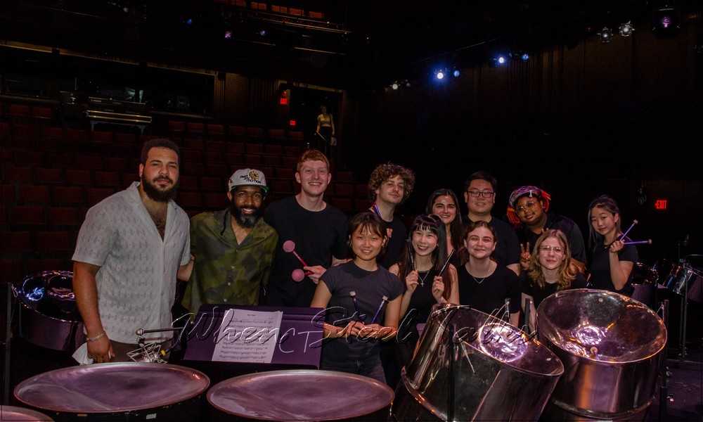 Daron Roberts, left, and Dr. Kendall K. Williams with NYU Steel after their concert