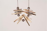 From the Liz Mannette Steelpan Jewelry line