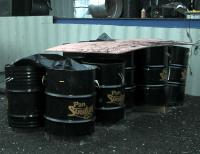 Sonatas' bass pan instruments ready, but covered against the drizzle at their band launch