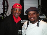 Keith "Designer" Prescott (right) with 'Ah Coming Down' composer Miguel Reyes