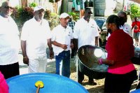  Pan Trinbagos president Keith Diaz, from left, Arts and Multiculturalism Minister Winston Gypsy Peters, Errol Peru and National Security Minister Brigadier John Sandy listen to Arima Marsicans