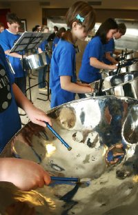 Members of the St. Vincent Elementary School steel drum band Pannation perform a lunch hour concert for employees at St. Thomas Hospital. It was the band's first public performance.