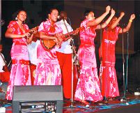 Parang queen Alicia Jaggasar (on cuatro) leads 2010 National Parang champion and Best Tune of Choice winner, Los Alumnos de San Juan