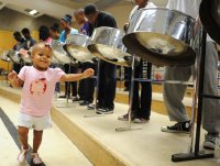 Two-year-old Aliyah Ball grooves during a dress rehearsal at Rosedale Heights School