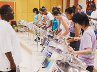 Members of the Jesse Ketchum Steel Band practice for Caribana Monday afternoon at Rosedale Heights School of the Arts