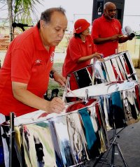 The P-K Hummingbird Steel Band, of Thorold, plays during the Chatham-Kent Caribbean Festival on Saturday at Leclair Hidden Hills Farm