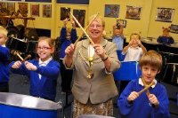 Mayor Norma Lincoln joins Laceby Acres Primary School pupils playing the steel pans during the Music and Performing Arts Service world music workshop at Whitgift School in Grimsby