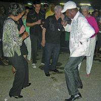 Soca-parang King Scrunter got most patrons out of their seats, and even gave a few free dance lessons. 