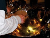 A member of the Oklahoma City Santa Fe South High School Steeldrum Corps performs at Northern Oklahoma College Enid during the Tri-State Music Festival Thursday